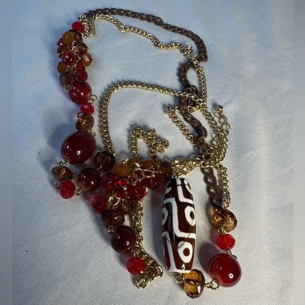 Long goldtone sparkly statement necklace